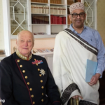 Danjire C/Kariim Axmed oo waraaqihii aqoonsiga u gudbiyay Boqorka Norway